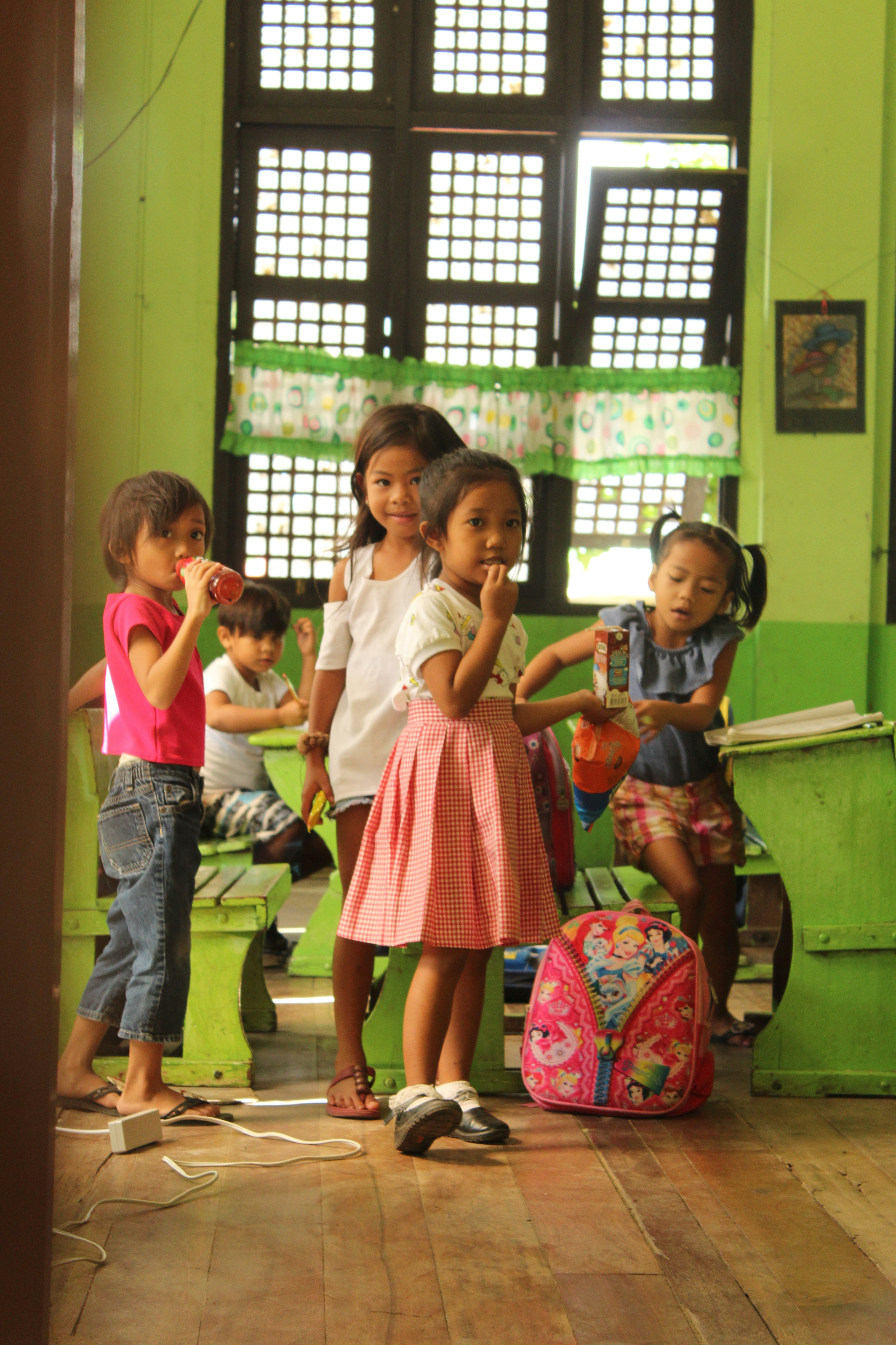 Children in classroom learning