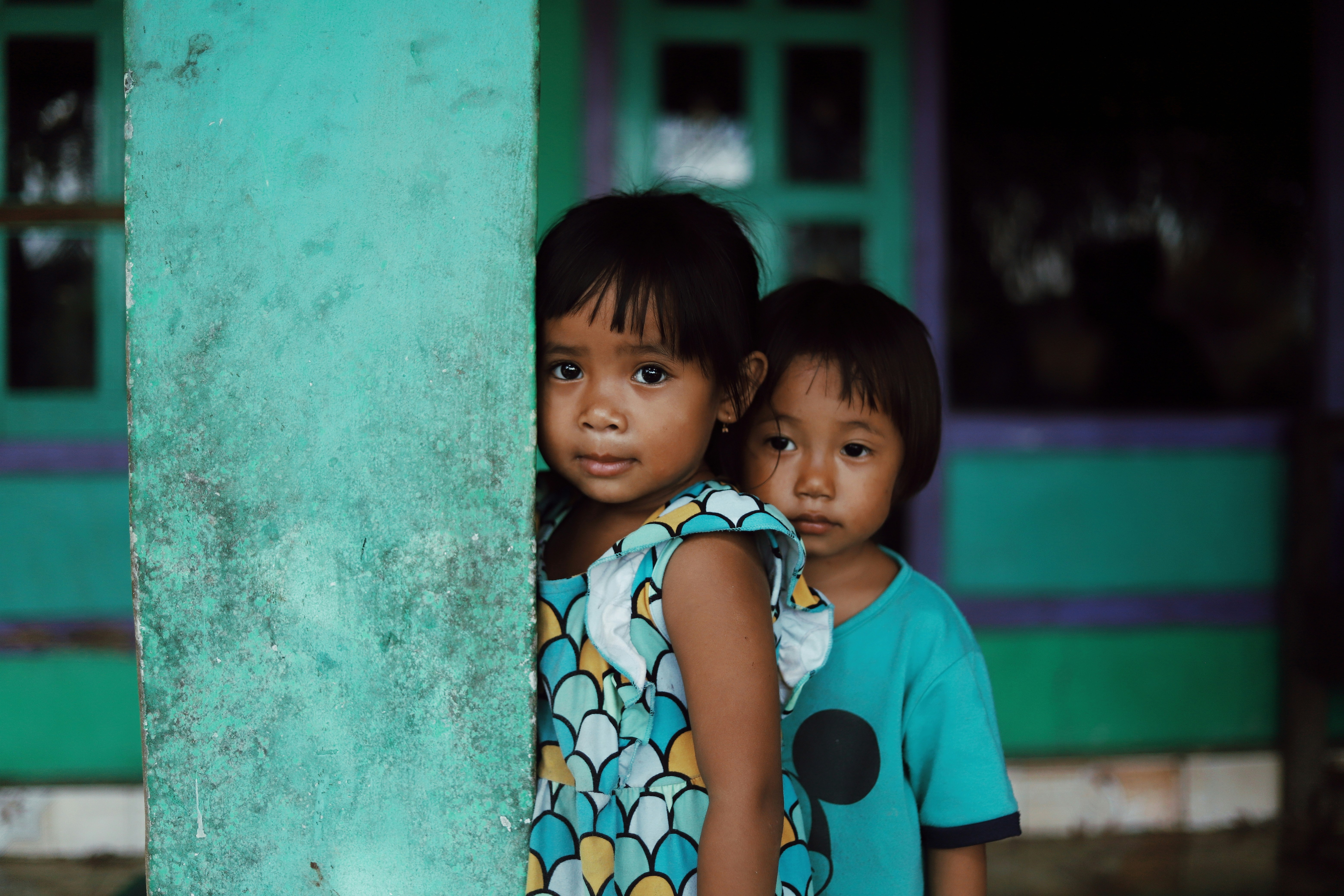 Two children embracing